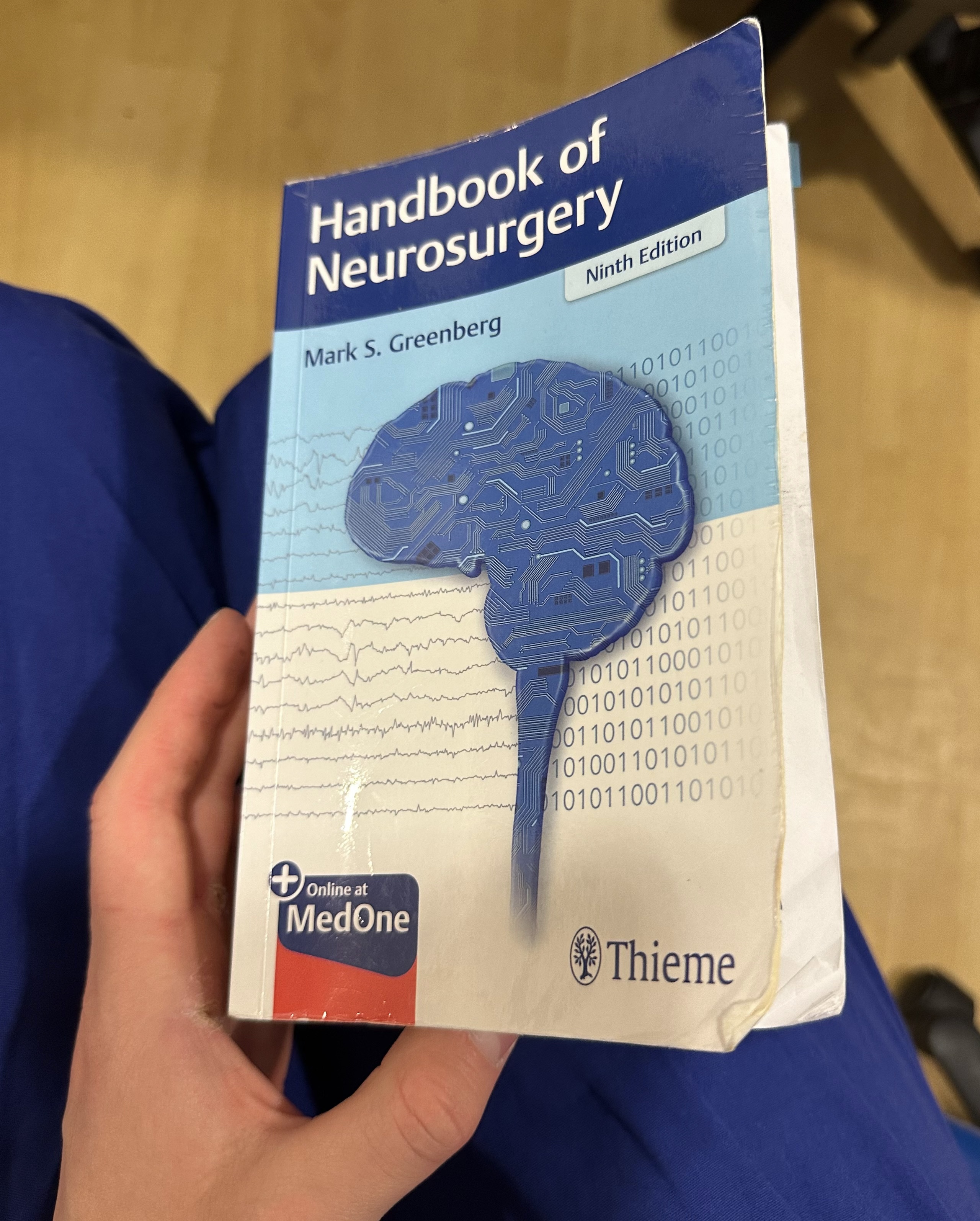 A well-used copy of the Handbook of Neurosurgery